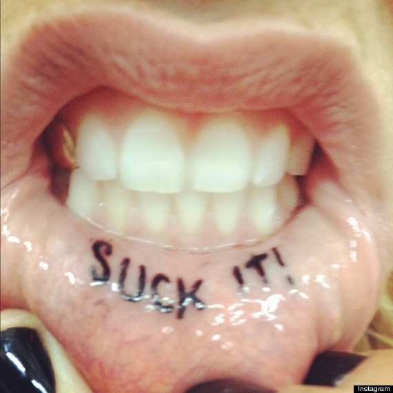 Suck it lips tattoo