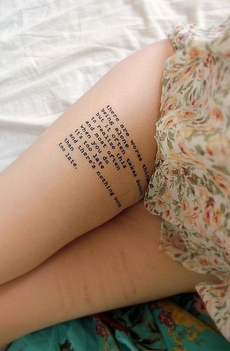 Words tattoos on legs