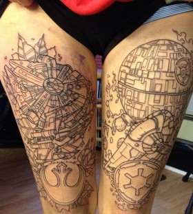 Town ornaments and star tattoo on leg