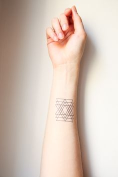 Triangle tattoos on arm