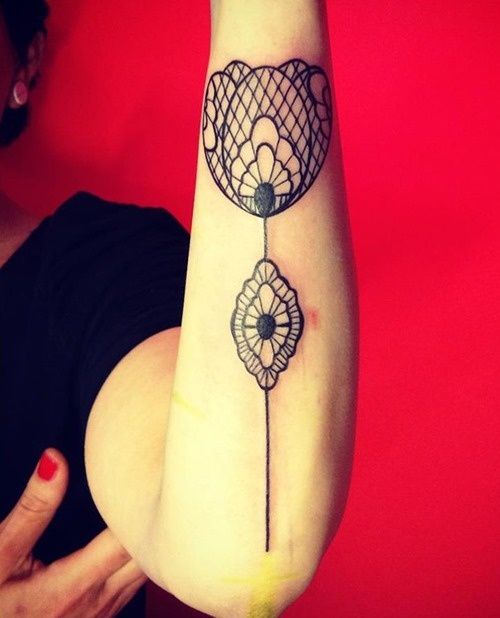 Tulip tattoo on arm