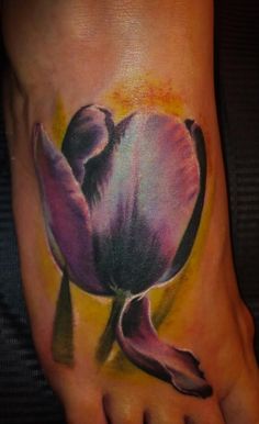 Tulip tattoo on foot