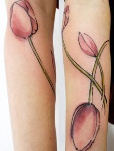 Tulips tattoos on arms