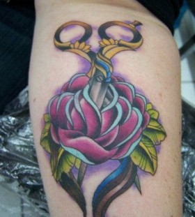 Unique purple rose tattoo on arm