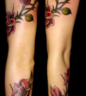 Unique red rose tattoo on leg