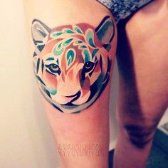 Unique watercolor tiger tattoo on leg