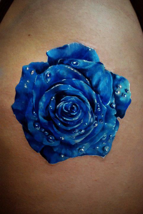 Water droplets and blue flowers tattoos