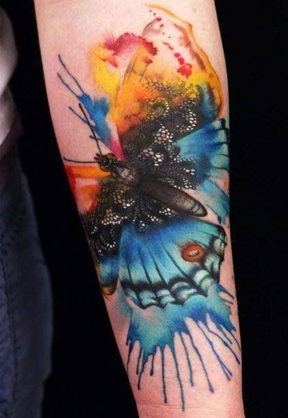 Watercolor awesome butterfly tattoo on arm