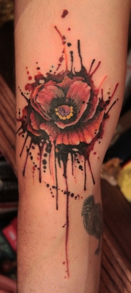 Watercolor flower tattoo on hand