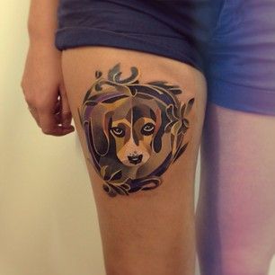 Dogs tattoos on legs