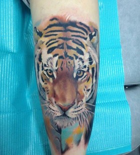 Watercolor style tiger tattoo on leg