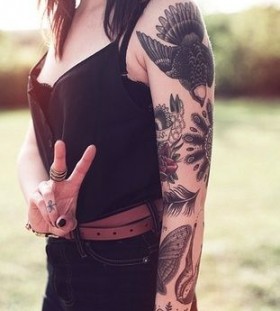 Women awesome bird tattoo on arm
