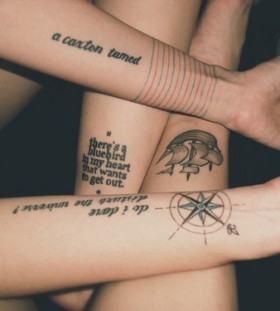 Women compass, quotes and map tattoo on legs