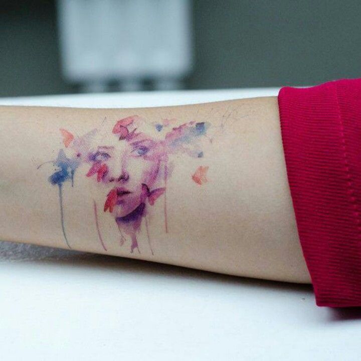 Women face and butterfly watercolor tattoo