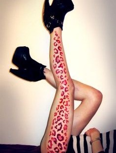 Women red tiger tattoo on leg
