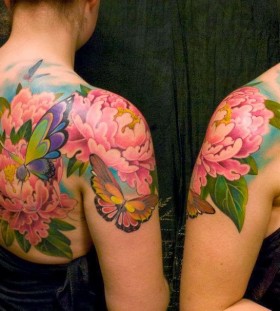 Women shoulder butterfly tattoo on arm