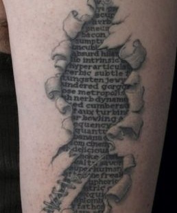 Women's arm book tattoo on arm