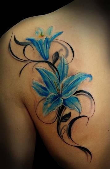 Yellos and black blue flowers tattoos