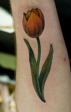 Yellow tulip tattoo