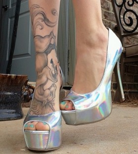 unicorn tattoo on leg