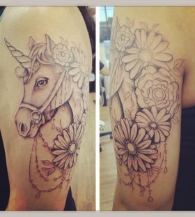 unicorn tattoo with flowers