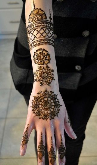 Adorable black Henna and Mehndi design tattoo