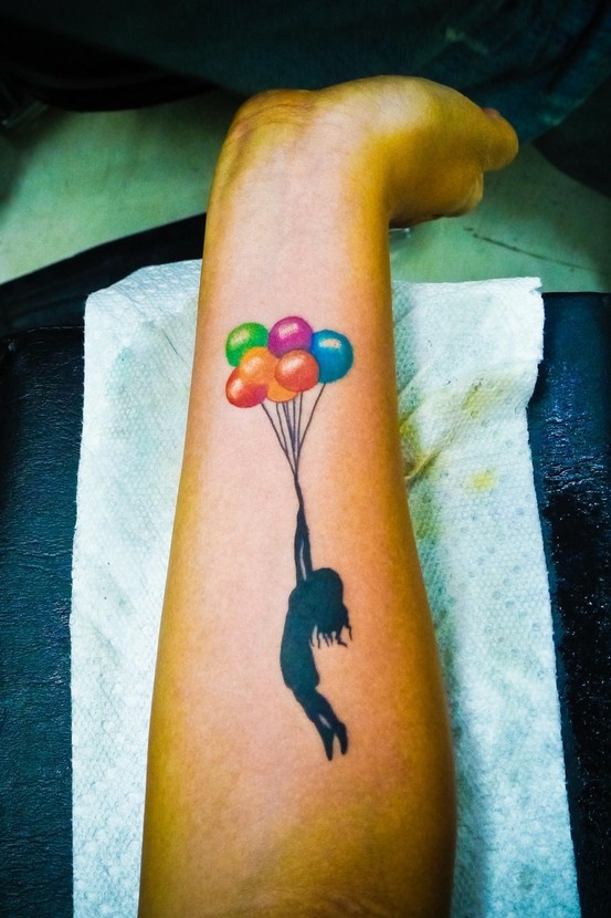 Adorable hand balloon tattoo