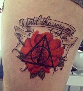 Adorable red flower and Harry Potter tattoo