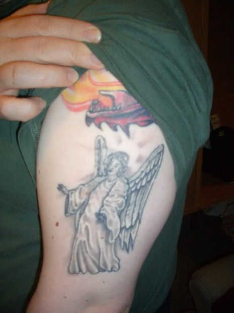 Amazing black angel tattoo on arm