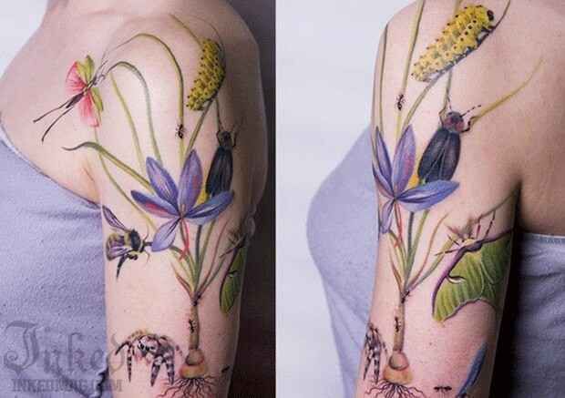 Amazing colorful flowers green tattoo