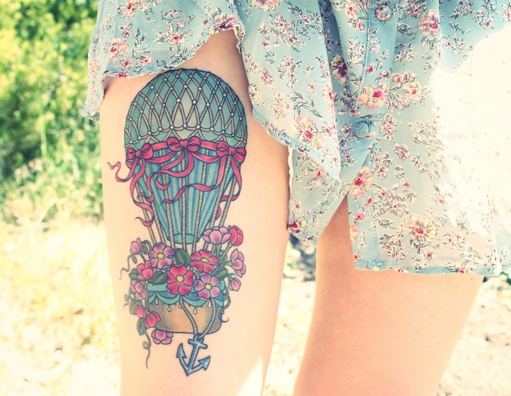 Amazing colorful girl’s balloon tattoo