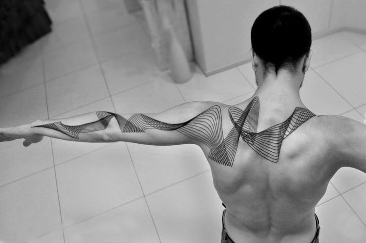 Amazing looking geometric shoulder, back tattoo