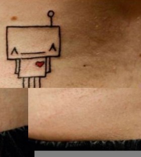 An addorable black robbot tattoo