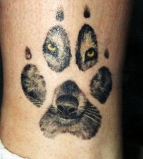 Angry wolf eyes green tattoo