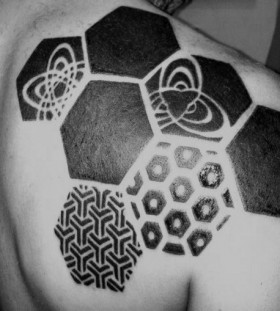 Astro style black geometric shoulder, back tattoo