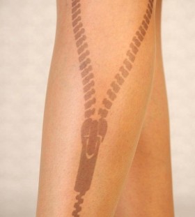 Awesome black zip tattoo