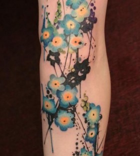 Awesome blue and yellow tattoo