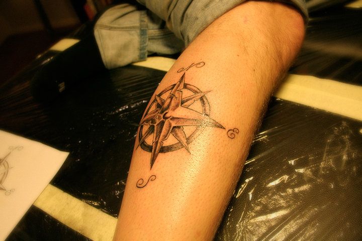 Awesome looking compass tattoo on leg