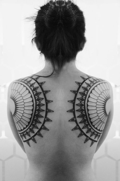 Awesome looking girl’s geometric shoulder, back tattoo