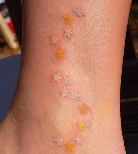 Awesome star yellow tattoo