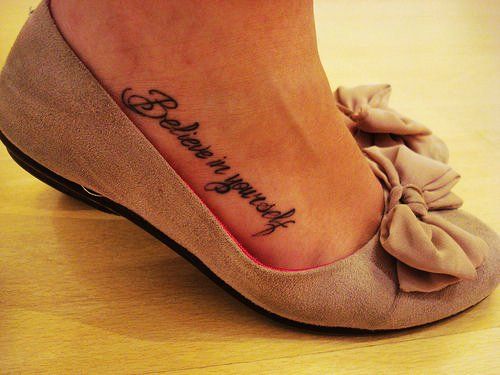 Believe in yourself girl tattoo on foot