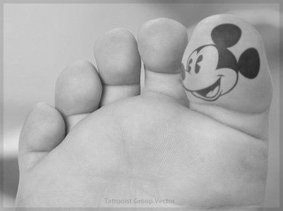 Big finger Mickey Mouse tattoo on leg