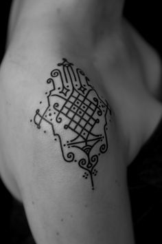 Black adorable geometric shoulder, back tattoo