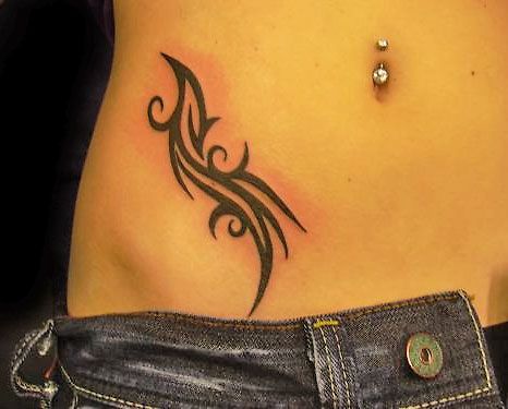 Black and red girl tattoo on hip