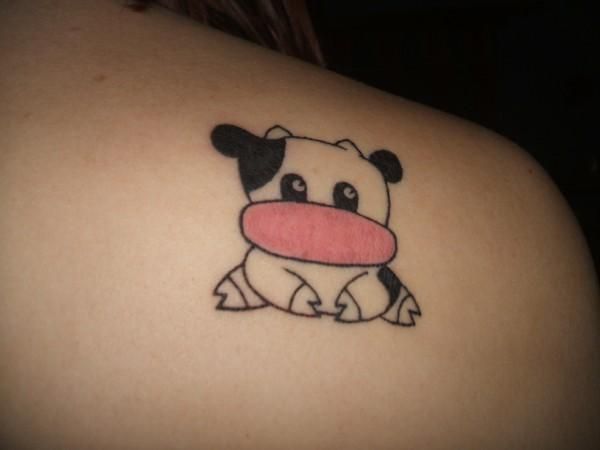 Black and white lovely cow tattoo