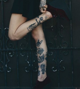 Black lovely girl tattoo on leg