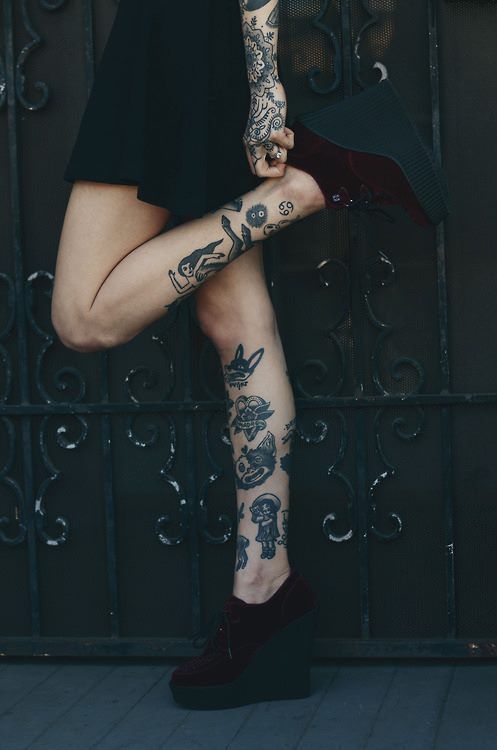 Black lovely girl tattoo on leg