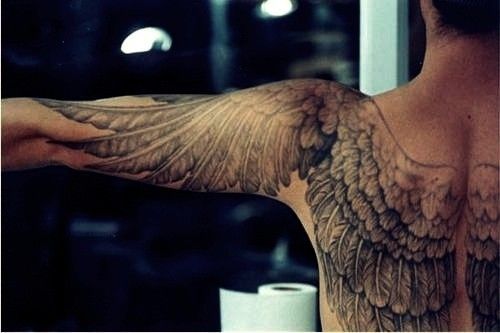 Black men’s angel tattoo on shoulder