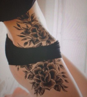 Black roses girl tattoo on hip