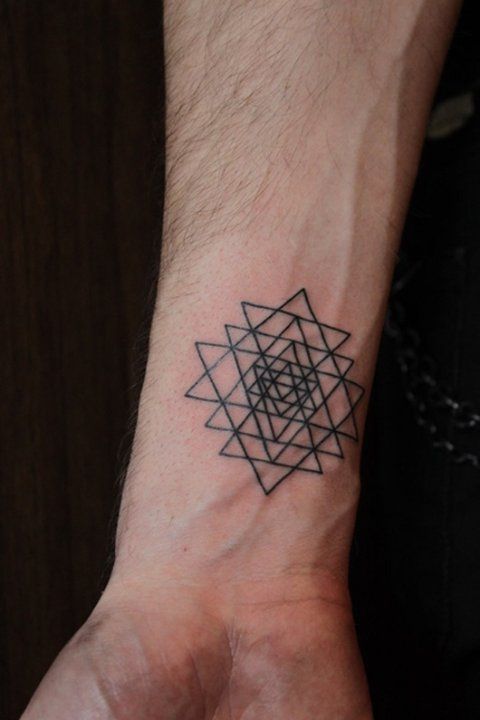 Black simple geometric arm tattoo